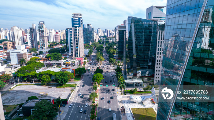 Aerial view of Avenida Brigadeiro Faria Lima, Itaim Bibi. Iconic commercial buildings in the background. With mirrored glass