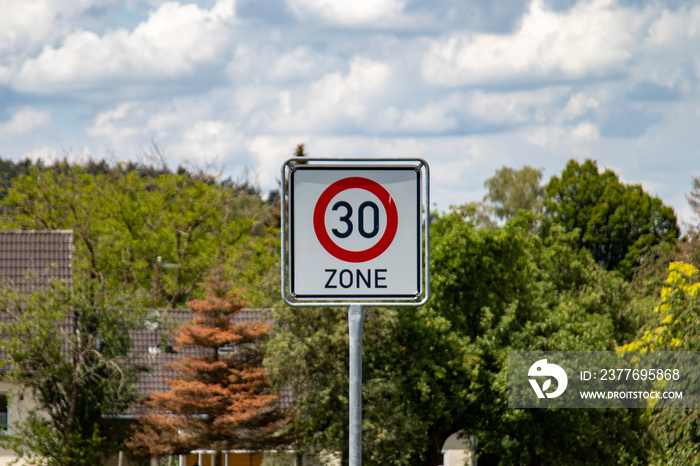 German road sign zone 30 km / h in a rural area