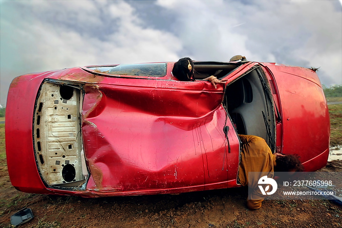 Injured and unconscious people accident car, A crashed car in the forest