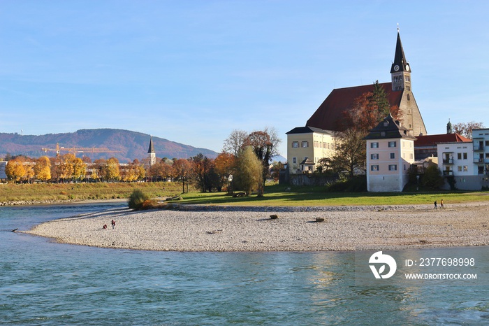 The Salzach river and the collegiate church Maria Himmelfahrt in Laufen, Bavaria, Germany. The river forms the border between Austria and Germany.