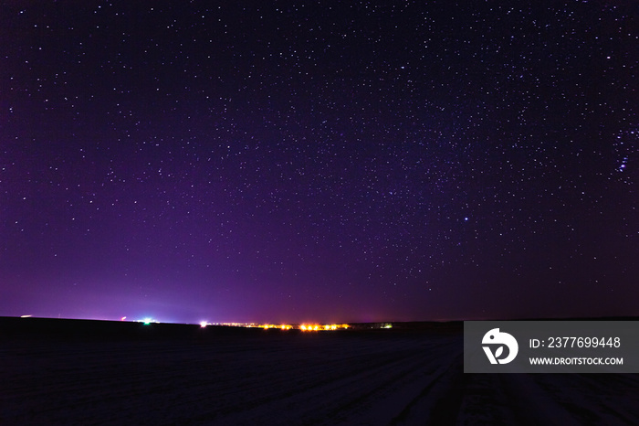 Dark Purple Magenta Colors Sky. Landscape With Natural Night Sky Stars Background. Starry Sky Over Town