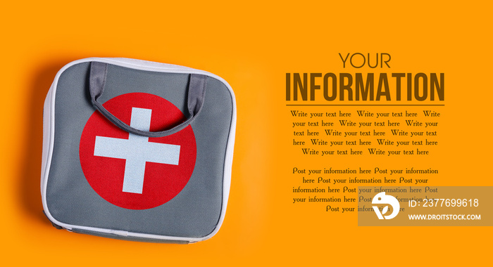 First aid kit on orange background, flat lay, top view, space for text