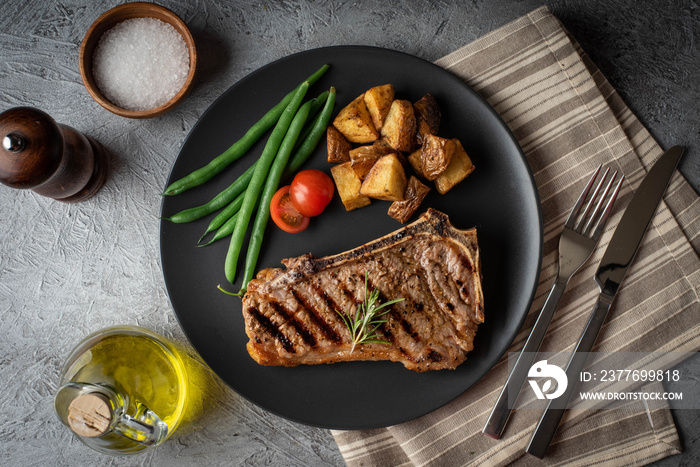 new york strip steak on concrete background