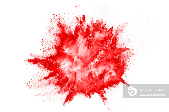 Freeze motion of red powder exploding, isolated on white background. Abstract design of red dust clo