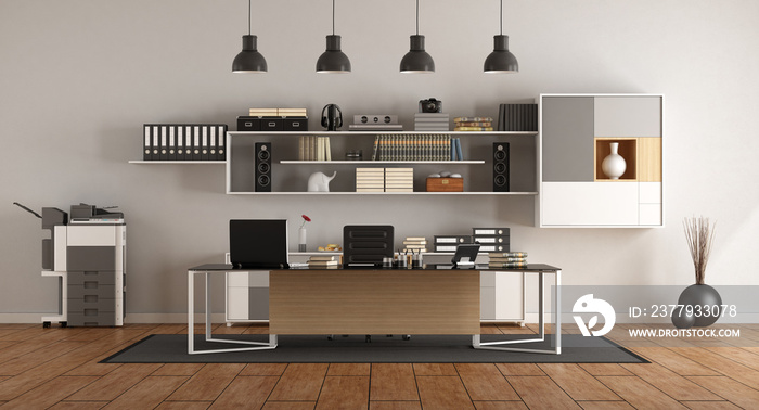 Modern office with desk and bookcase