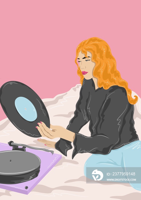 Girl looking at vinyl record