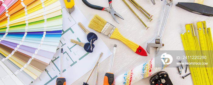 home improvement and renovation concept - construction tools and items. selective focus.