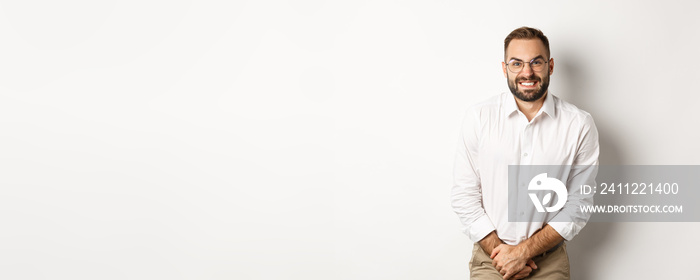 Troubled man having bladder problem, need toilet, standing over white background