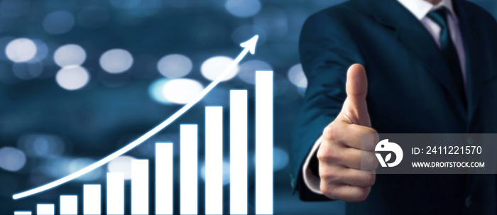 Businessman showing thumbs up sign. Growth graph. Success concept