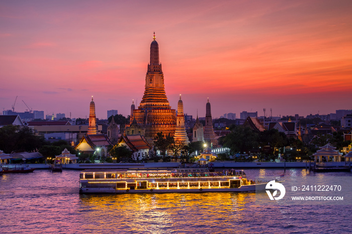 Wat Arun and cruise ship in sunset time, Bangkok city ,Thailand