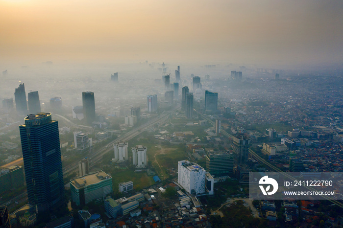 Misty Jakarta cityscape at morning time