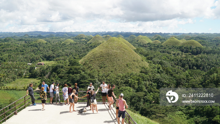 Green grass on the Chocolate Hills in Central Visayas on Bohol Island, Philippines.