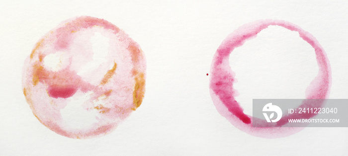 set of 2 hand painted pink and yellow aquarelle circles on white paper background