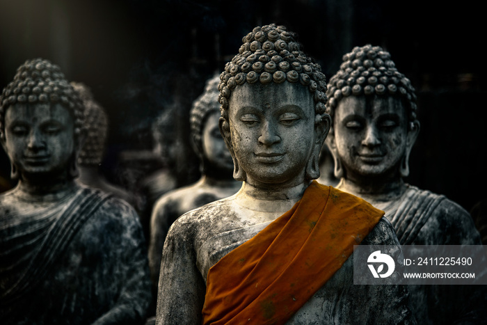 Buddah statue with ancient stupas in Buddhist temple. at saraburi, thailand