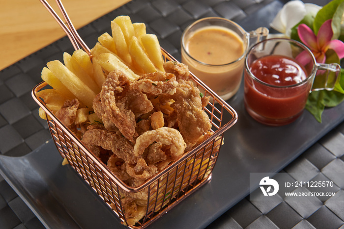 Crispy chicken skin With french fries Popular dishes in Thailand