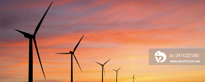 Wind turbines at sunset