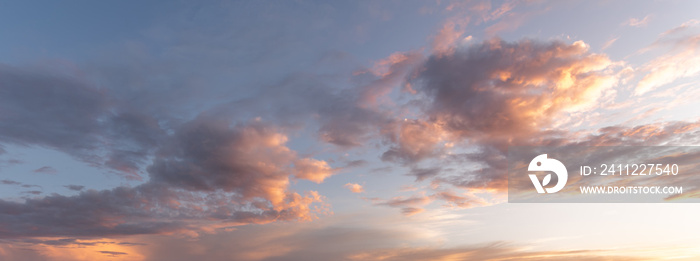 Glowing sky at dusk on a fall evening. Banner, panoramic.