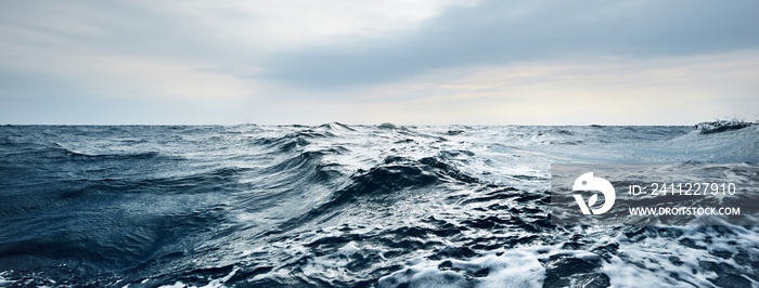 Glowing clouds above the open Baltic sea before the thunderstorm. Sweden Dramatic sky, epic seascape. A view from the yacht. Sailing in a rough weather