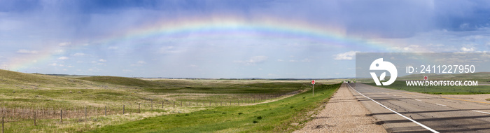 Rainbow over the highway in Saskatchewan