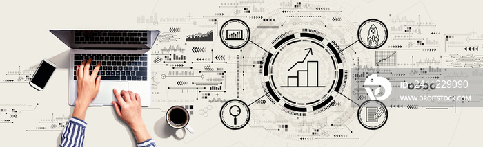 Business growth analysis with person using a laptop computer