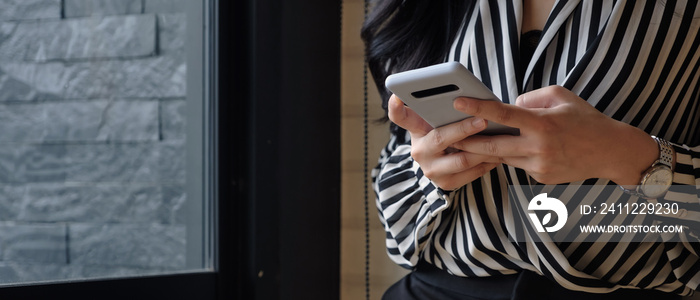 Asian woman using smartphone for social network