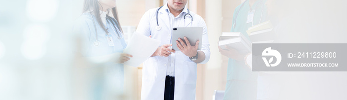 A group of healthcare professionals working in hospital offices or clinics with other doctors, nurses and surgeonsand medical personnel service concepts banner.