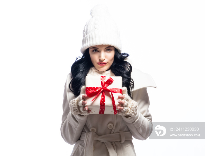 Young woman holding a Christmas gift box