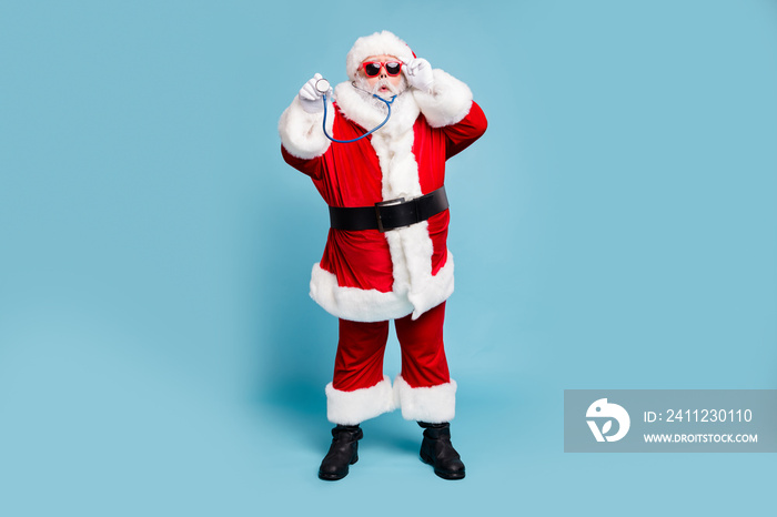 Full length body size view of his he nice funky bearded Santa Claus wearing phonendoscope making dia