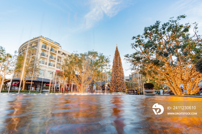 Night view of the fountain and the public art Spirit with christmas tree of American Youth in The Am