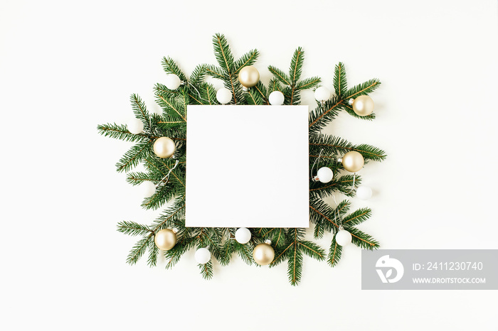 Christmas / New Year composition. Square mock up frame with blank copy space, fir branches, Christma