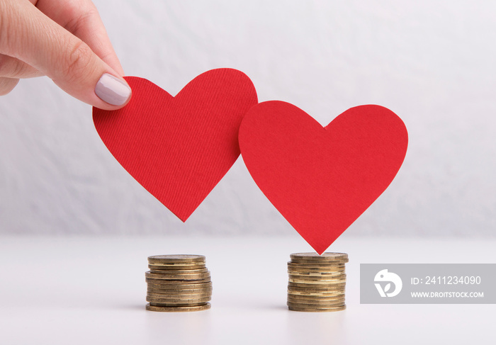 Creative red hearts and money savings for wedding concept