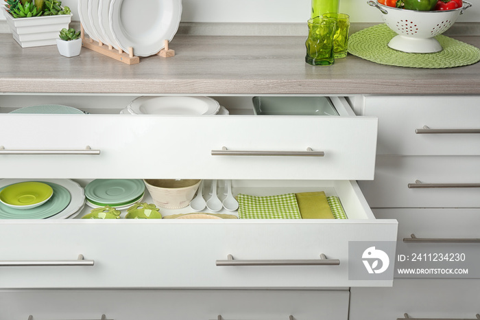 Drawers with different kitchenware