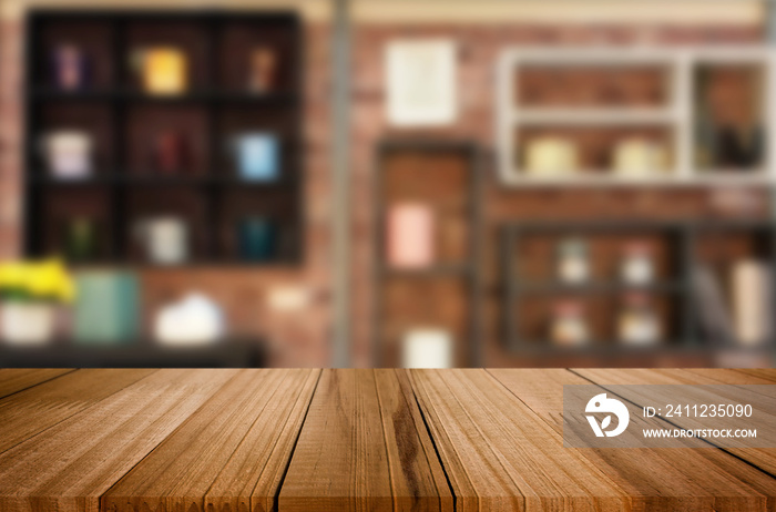 Wooden board empty Table Top And Blur Interior over blur in coffee shop Background, Mock up for disp