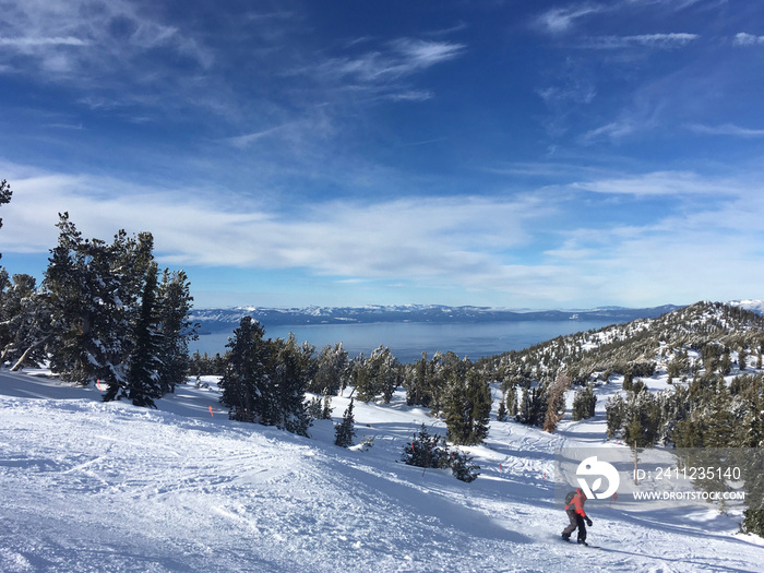 Landscape views of Lake Tahoe from a ski resort, on a cloudy winter day