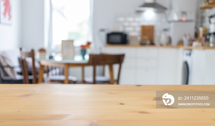 empty wooden tabletop and blurred kitchen mock up for product display