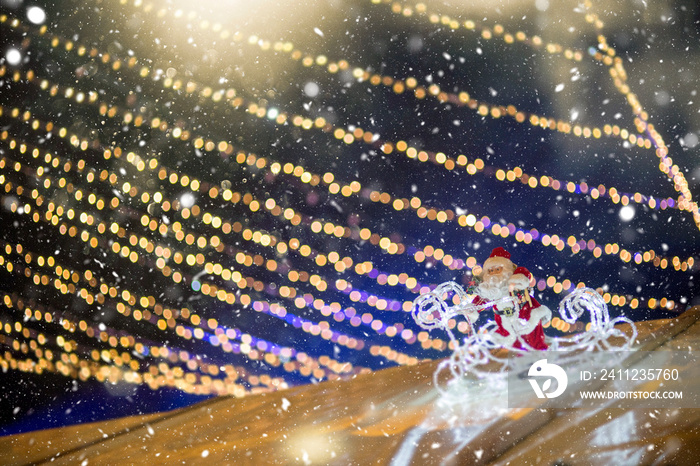 Defocused Christmas themed background with snowflakes. Christmas market theme.