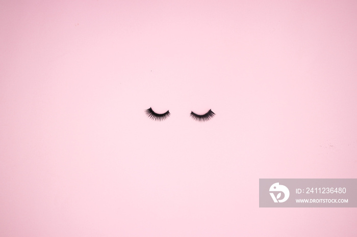 Eye lashes on the pink background