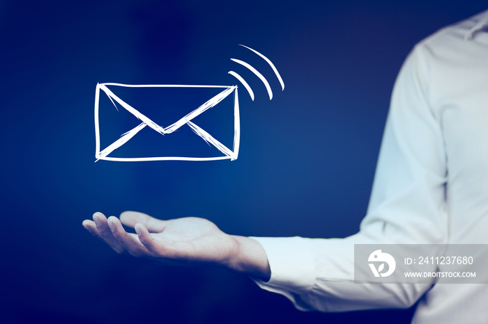 man holds a virtual postal envelope