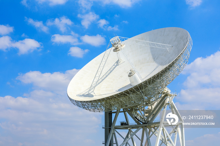 Observatory radio telescope under the blue sky in Shanghai.