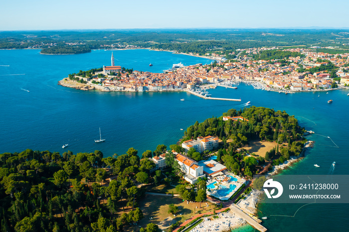 Rovinj surroundings with church of St. Euphemia near Adriatic sea. Villas with swimming pools and bu