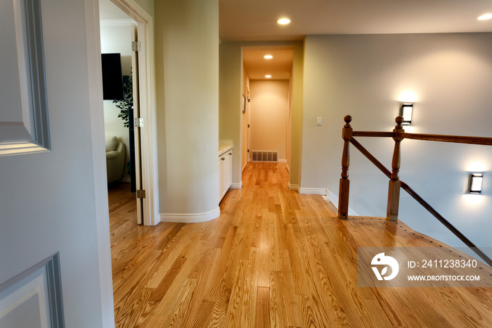 Newly installed oak floor boards for hallway in home