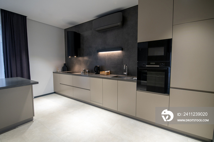 Contemporary kitchen with the high-tech cooking equipment