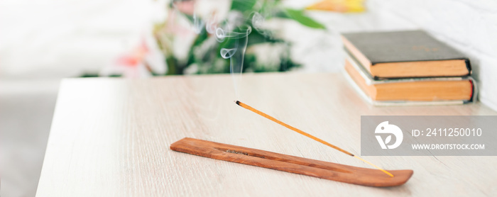 incense sticks on incense stands are on the table, an addition to the interior, meditation