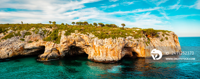 Cala Barquez, Mallorca, Spain. Cliffs and caves, ocean.