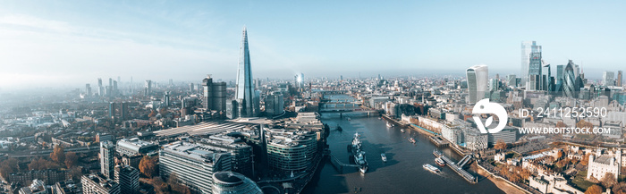 Stunning panorama view over Thames river, the Shard, the London skyline and cityscape from the skyscraper. Aerial photo over the big city.