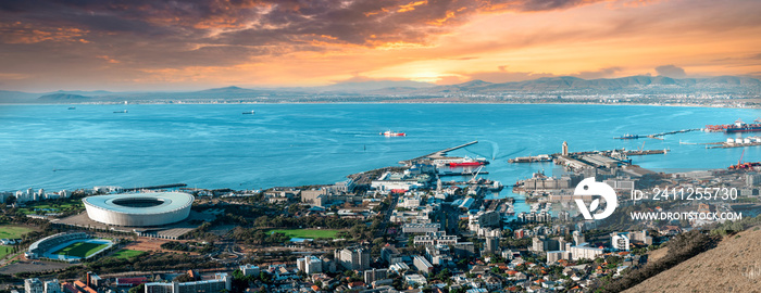 Scenic view of waterfront and Cape Town stadium from Signal Hill - enhanced dramatic sunset sky - Great outdoors adventure travel destination, Cape Town, South Africa
