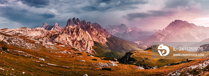 Awesome alpine highlands during sunset. Incredible view of Dolomites Alps. landscape of Tre Cime di Lavaredo National park. Picture of wild area. Amazing Nature Landscape. Fantastic scene in summer.