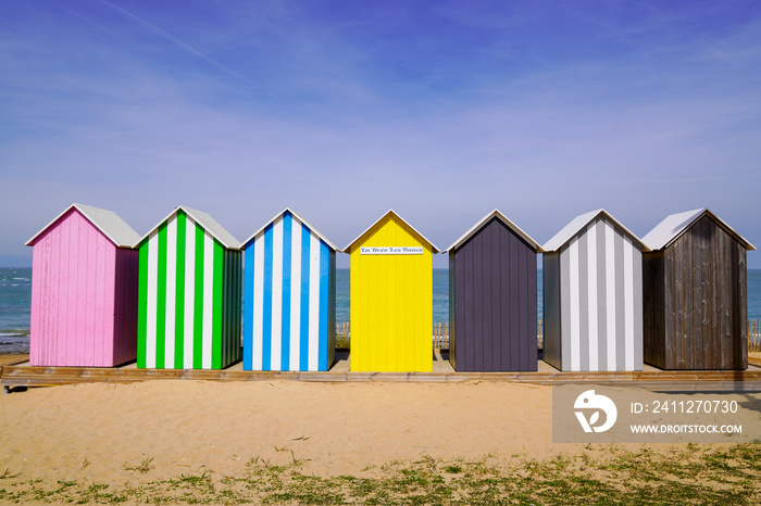 Colored beach huts La Bree-les-Bains  city on beach oleron french isle