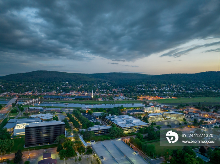 Late afternoon, early evening aerial image of Corning NY looking southwest toward the city