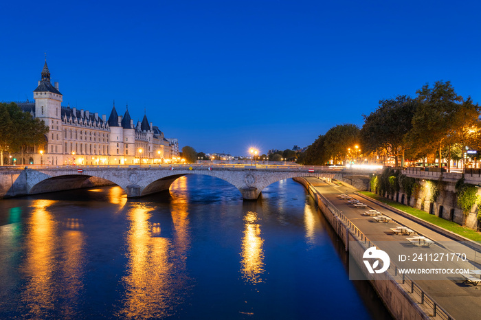 Cityscape of Paris by the Seine river at down. France